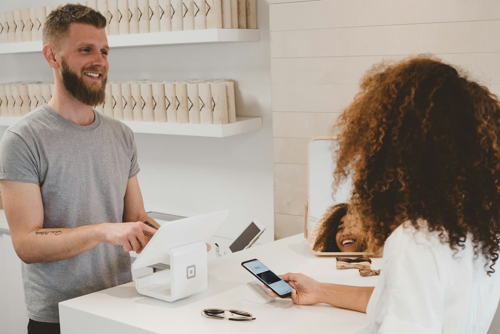 Contactless payment terminal suggesting fast, secure checkout flows.